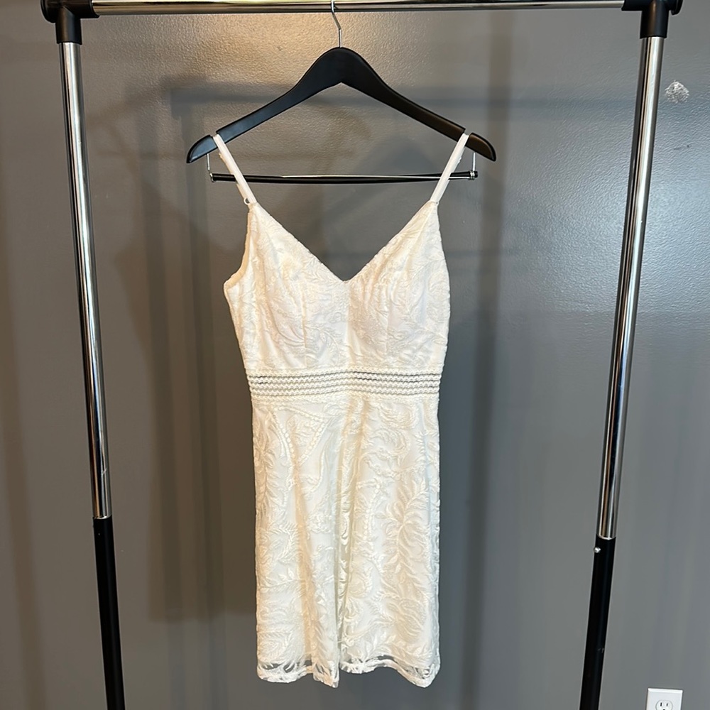 Xtraordinary white lace mini dress size 3